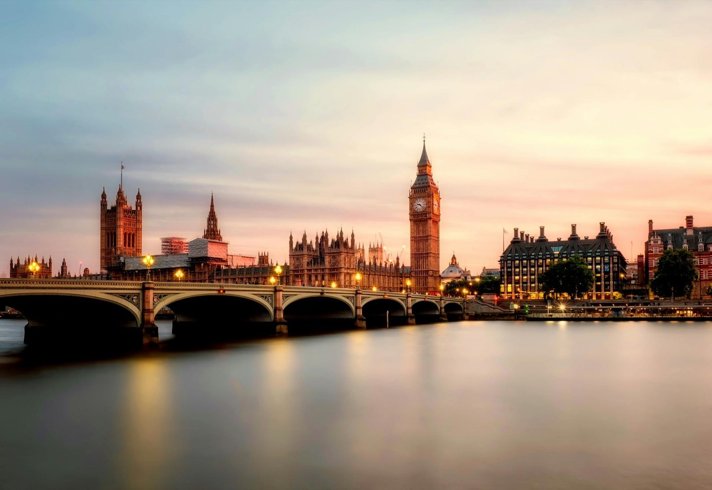 London skyline with Big Ben and Parliament reflected on the Thames