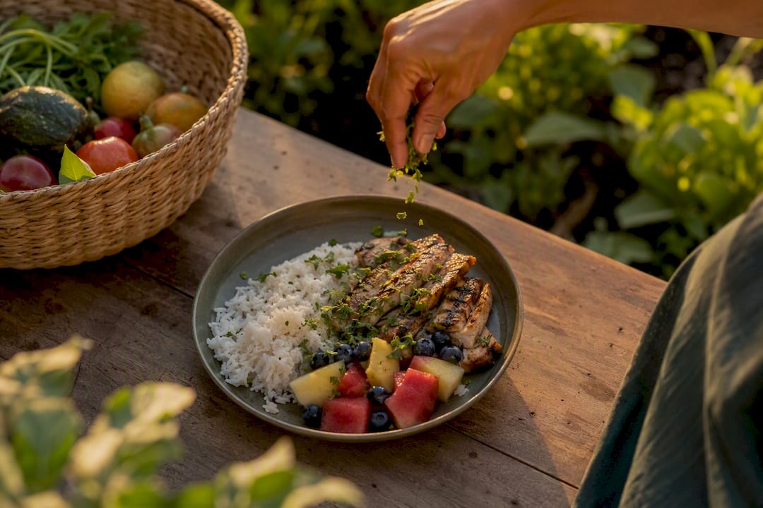 Balanced meal plate with fruit, protein, starch